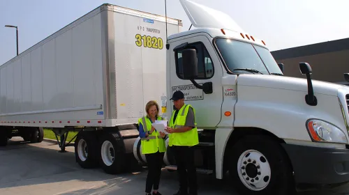 Image of NPO Transportation workers in front of a truck