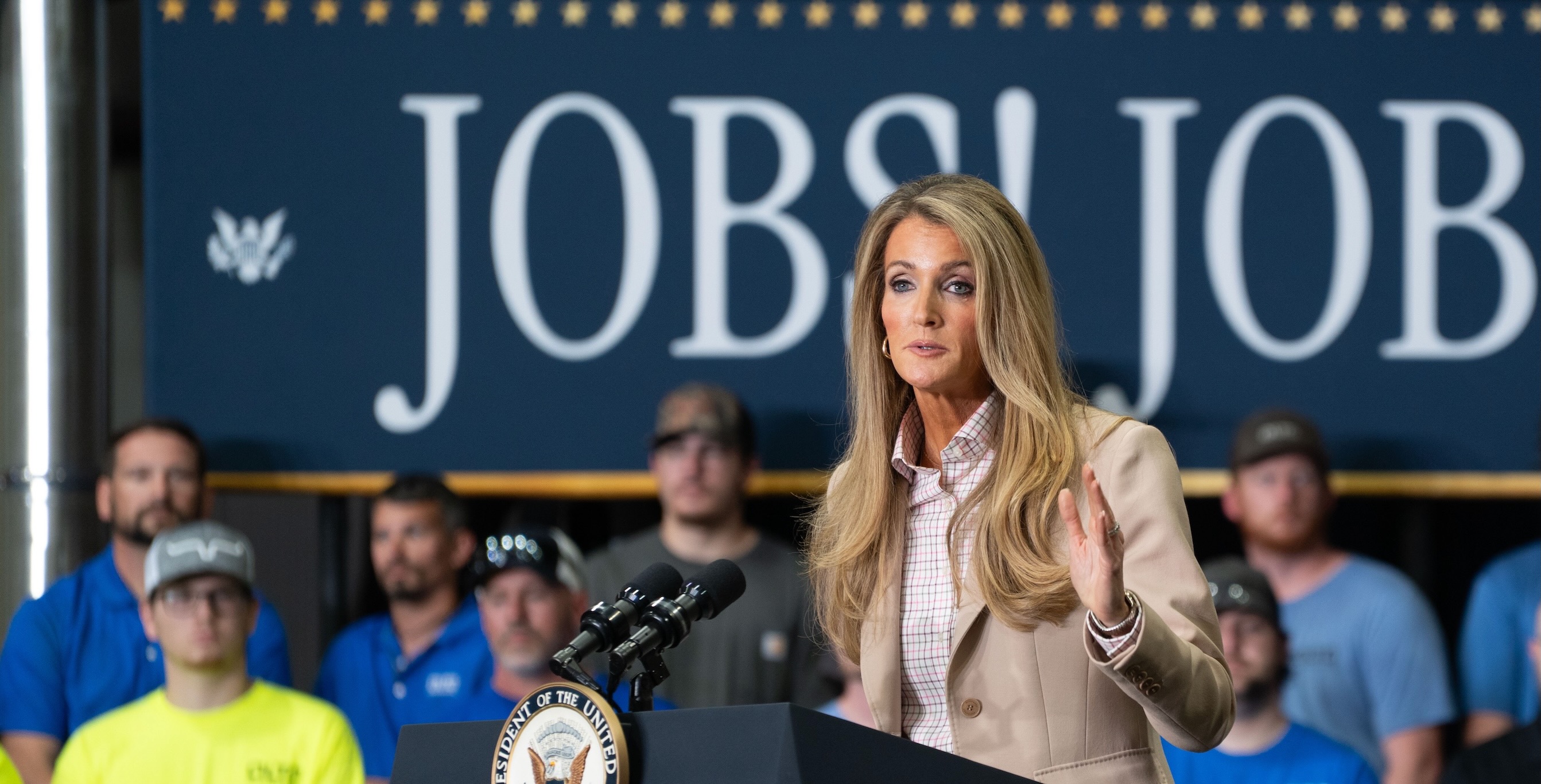 Kelly Loeffler speaking with small business owners