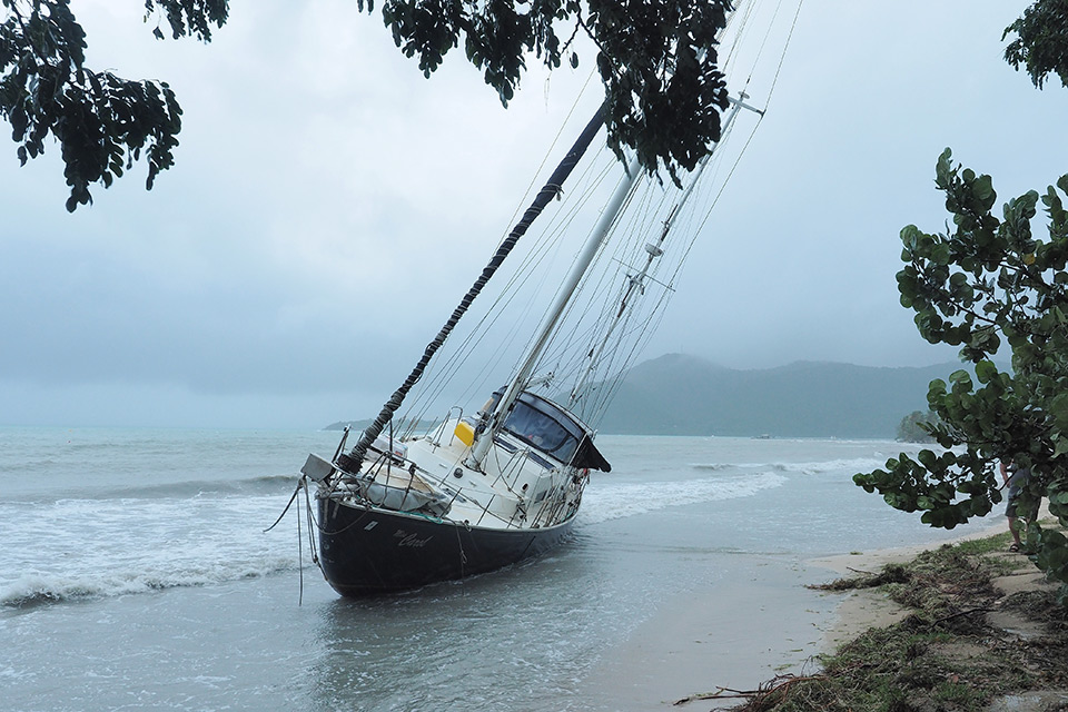 Image of boat stranded on beach