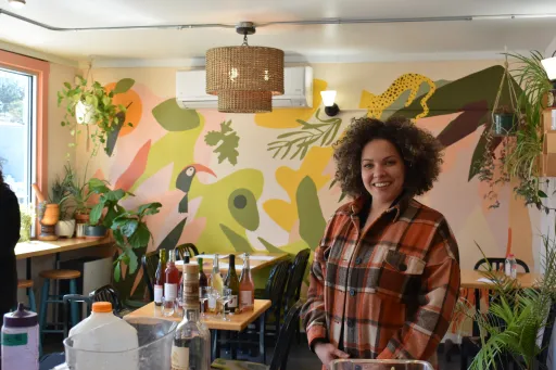Owner and Founder Maria Lara-Bregatta serves up a delicious meal at Cafe Mamajuana